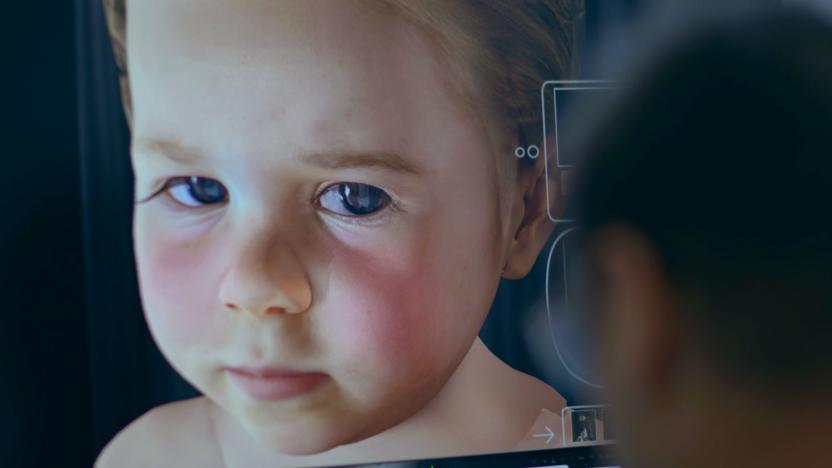 A CG model of a child is seen on a screen over the shoulder of a blurry person in this promotional still for the documentary Eternal You.