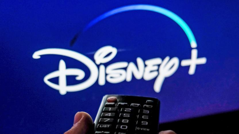TV remote control is seen with Disney+ logo displayed on a screen in this illustration photo taken in Krakow, Poland on February 6, 2022. 