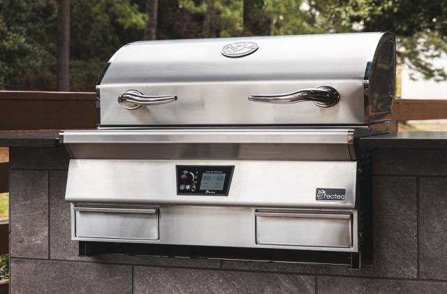 Recteq E-Series Built-In 1300 smart pellet grill designed for outdoor kitchens. The all-stainless-steel grill is closed and mounted on an outdoor counter.