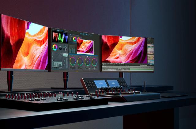 ASUS ProArt Display PA27UCX-K monitor in a video editing setup.