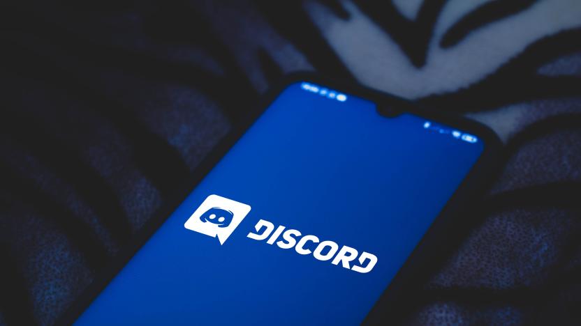In this photo illustration a Discord logo seen displayed on...