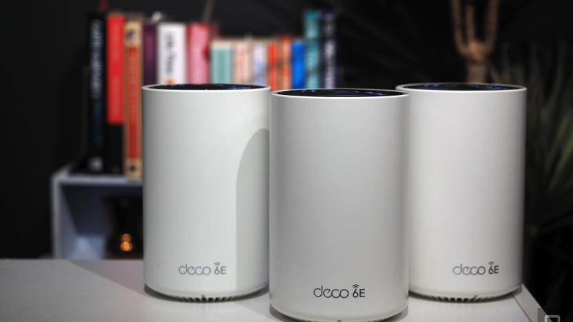 Image of three Deco 6E modules on a white table in front of a bookshelf.
