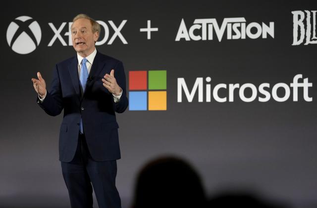 Microsoft President Brad Smith addresses a media conference regarding Microsoft's acquisition of Activision Blizzard and the future of gaming in Brussels, Tuesday, Feb. 21, 2023. (AP Photo/Virginia Mayo)