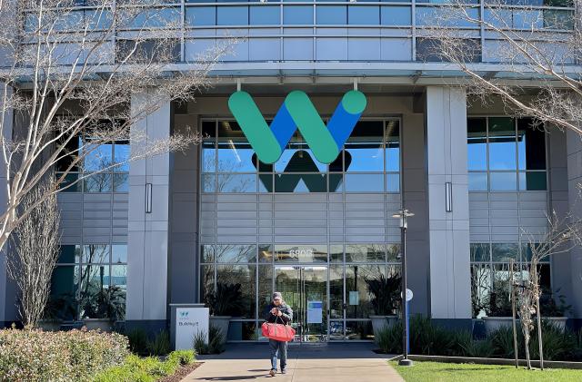 MOUNTAIN VIEW, CALIFORNIA - MARCH 01: A sign is posted on the exterior of a Waymo office on March 01, 2023 in Mountain View, California. Waymo, Alphabet's self-driving car division, announced that it has laid off over 135 employees in a second round of layoffs this year. Waymo has cut 8 percent of its workforce this year. (Photo by Justin Sullivan/Getty Images)