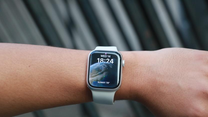 The Apple Watch Series 8 on a wrist held up in mid-air.