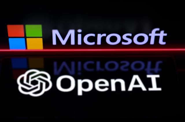 The OpenAI logo is being displayed on a smartphone, with the Microsoft logo visible on the screen in the background, in this photo illustration taken in Brussels, Belgium, on January 6, 2024. (Photo by Jonathan Raa/NurPhoto via Getty Images)