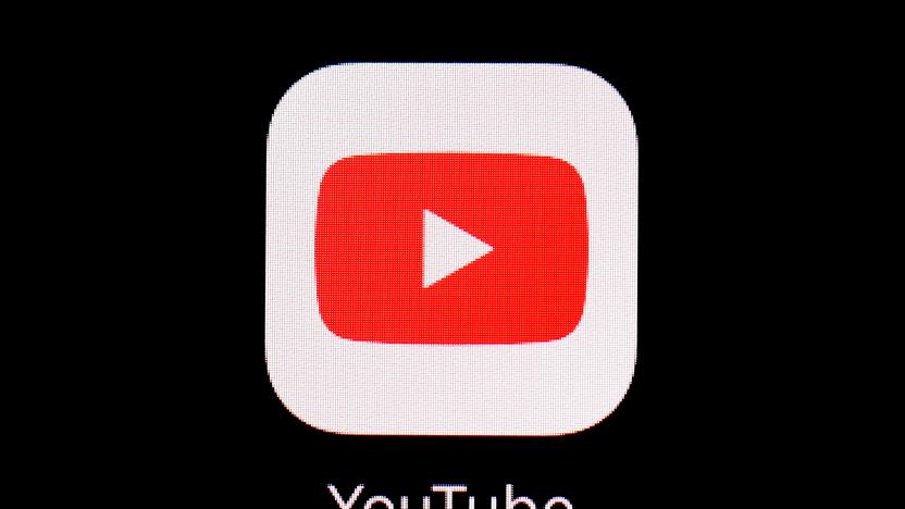 FILE - The YouTube app is displayed on an iPad in Baltimore. Police said Wednesday, Jan. 31, 2024, that they charged Justin Mohn, 32, with first-degree murder and abusing a corpse after he beheaded his father, Michael, in their Bucks County, Pa., home and publicized it in a 14-minute YouTube video that anyone, anywhere could see. (AP Photo/Patrick Semansky, File)