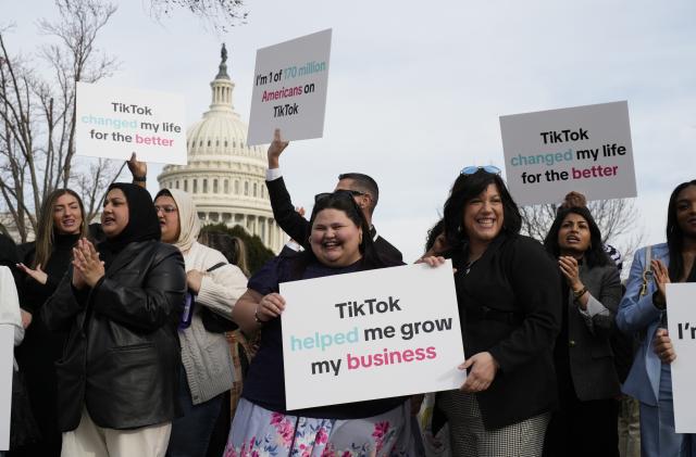 Devotees of TikTok gather at the Capitol in Washington, as the House passed a bill that would lead to a nationwide ban of the popular video app if its China-based owner doesn't sell, Wednesday, March 13, 2024. Lawmakers contend the app's owner, ByteDance, is beholden to the Chinese government, which could demand access to the data of TikTok's consumers in the U.S. (AP Photo/J. Scott Applewhite)