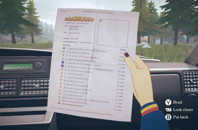 A still from the narrative-based video game Open Roads showing a POV view of a person holding a sheet of directions while sitting in the passenger seat of a car with woodlands seen through the windshield.