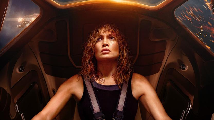 A woman (Jennifer Lopez) with a pensive expression sits inside a mech in Netflix movie Atlas.