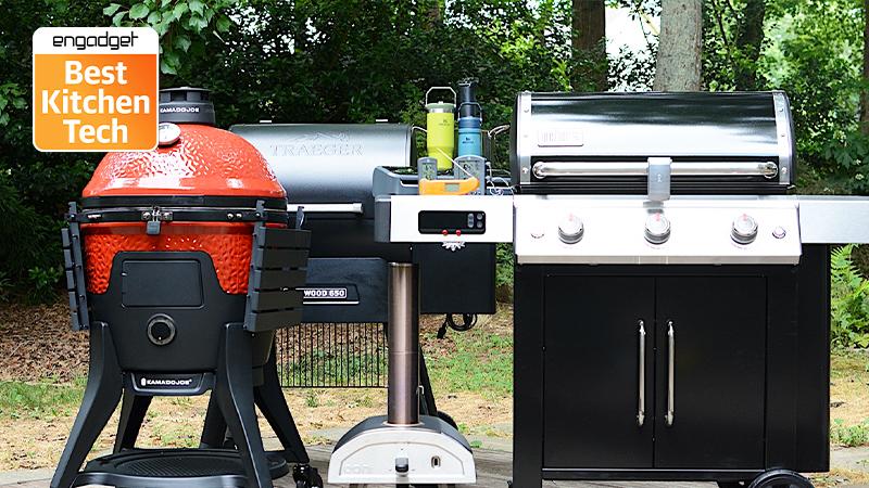 A group of outudoor grills on someone's backyard porch, along with a pizza oven, plus the Engadget Best Kitchen Tech badge on the top left corner.