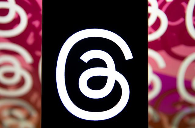 ANKARA, TURKIYE - NOVEMBER 01: In this photo illustration, the logo of Threads is displayed on a mobile phone in front of a computer screen displaying the logo of Threads in Ankara, Turkiye on November 01, 2023. (Photo by Didem Mente/Anadolu via Getty Images)