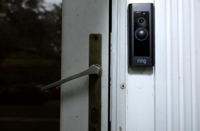 SILVER SPRING, MARYLAND - AUGUST 28: A doorbell device with a built-in camera made by home security company Ring is seen on August 28, 2019 in Silver Spring, Maryland. These devices allow users to see video footage of who is at their front door when the bell is pressed or when motion activates the camera. According to reports, Ring has made video-sharing partnerships with more than 400 police forces across the United States, granting them access to camera footage with the homeowners’ permission in what the company calls the nation’s 'new neighborhood watch.' (Photo by Chip Somodevilla/Getty Images)